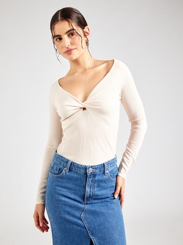ABOUT YOU T-shirt 'Perle' i beige: framsida