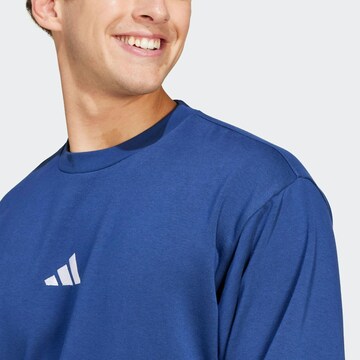 ADIDAS SPORTSWEAR Sports sweatshirt 'Feelcozy' in Blue