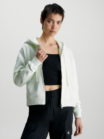 Calvin Klein Jeans Zip-Up Hoodie in Green: front