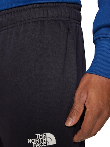 THE NORTH FACE Tapered Workout Pants 'Simple Dome' in Black