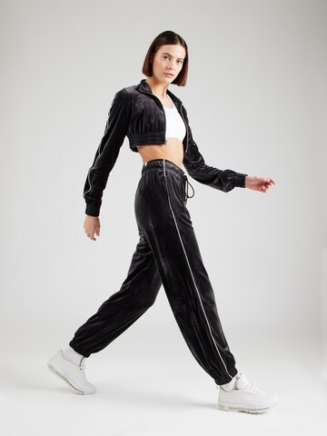 Nike Sportswear Tapered Housut värissä musta