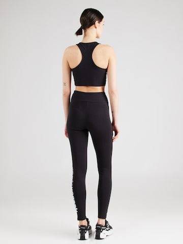 Skinny Pantaloni sport 'Rie' de la Reebok pe negru