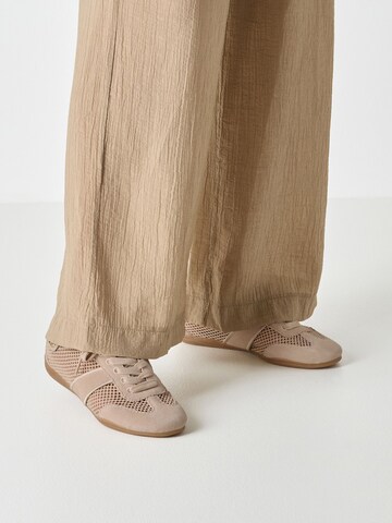 Chaussure de sport à lacets Tamaris en beige