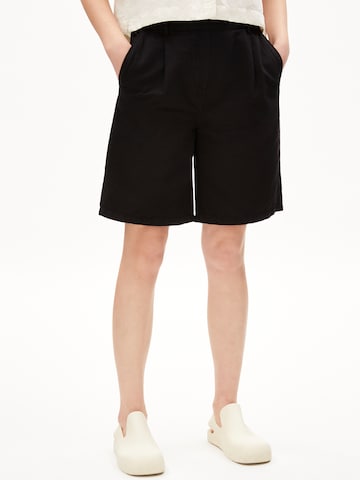 ARMEDANGELS Loose fit Pleat-Front Pants 'TOMMAA' in Black: front