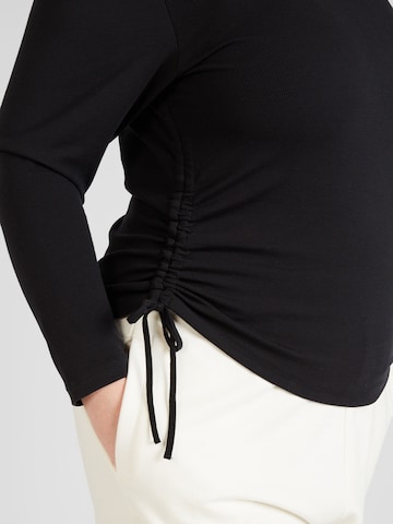 Nike Sportswear - Camiseta funcional 'ESSENTIAL' en negro