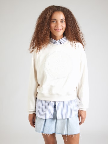 GUESSSweater majica - bež boja: prednji dio