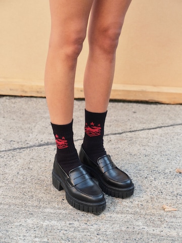 Pacemaker Socks in Black: front