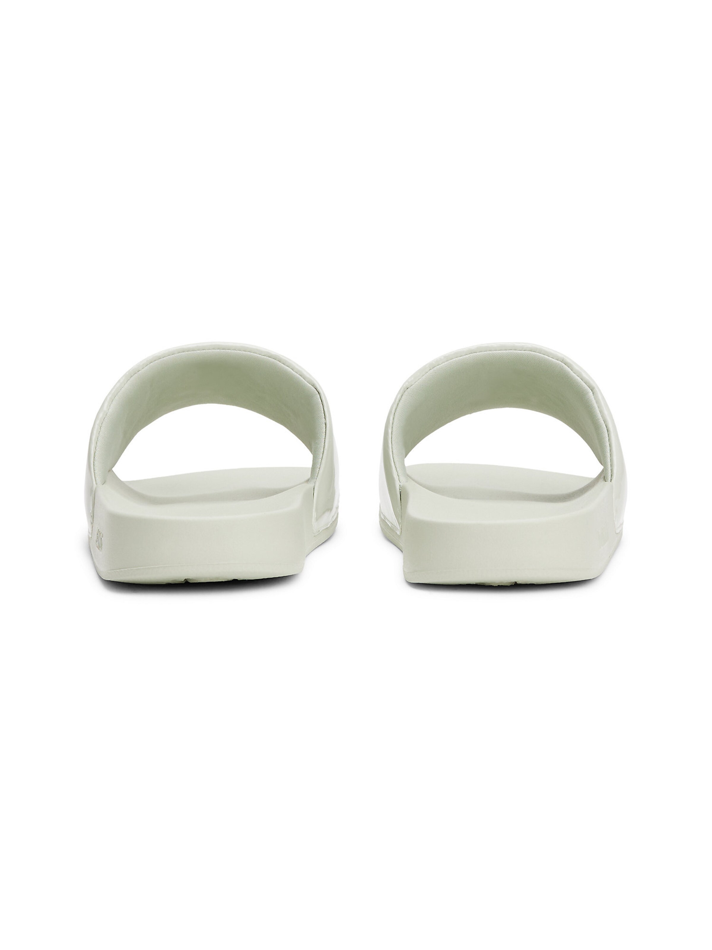 Claquettes / Tongs Tommy Jeans en blanc