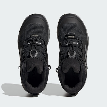 ADIDAS TERREX - Botas en negro