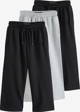 pilka Next Plačios klešnės Kelnės: priekis