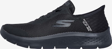 Baskets basses SKECHERS en noir : devant