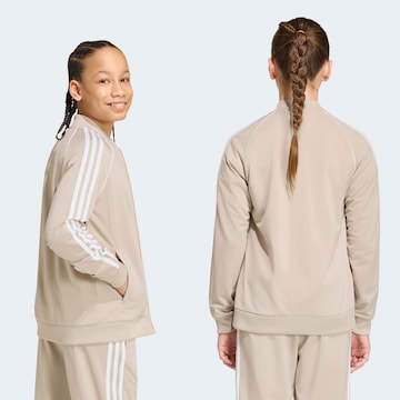 ADIDAS ORIGINALS - Casaco em moletão 'SST Track' em bege