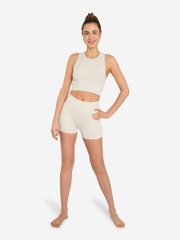 OCEANSAPART - Skinny Pantalón deportivo 'Maya' en beige