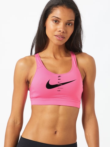 Regular Soutien-gorge de sport 'Impact' NIKE en rose : devant