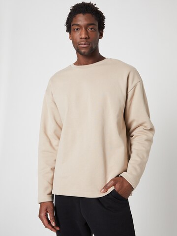 ABOUT YOU x Louis Darcis Sweatshirt in Beige: front