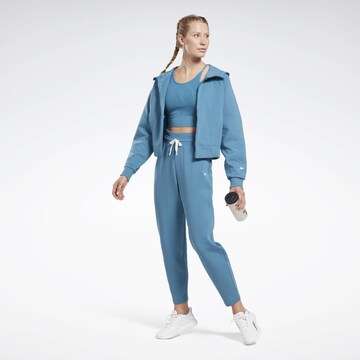 Effilé Pantalon de sport Reebok en bleu