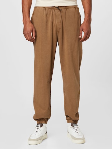 !Solid Tapered Pants in Brown: front