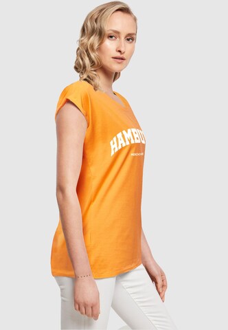 Merchcode T-Shirt 'Hamburg' in Orange