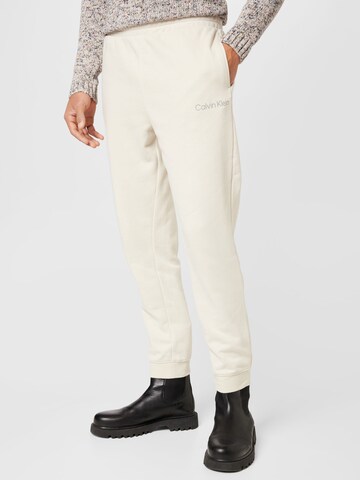 Calvin Klein Sport Tapered Workout Pants in Beige: front