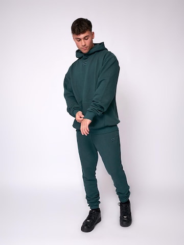 Pull-over 'Essential Oversized Hoodie' Fortex Fitness en vert