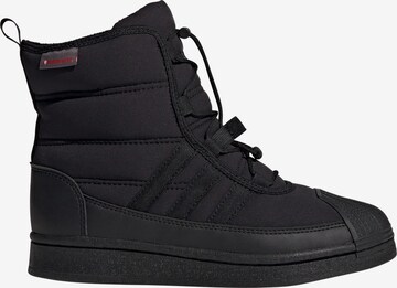 Boots da neve 'Superstar' di ADIDAS ORIGINALS in nero