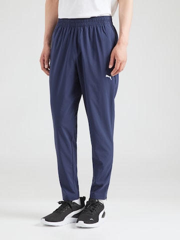 PUMA Zwężany krój Spodnie sportowe 'TAD ESSENTIALS' w kolorze niebieski: przód