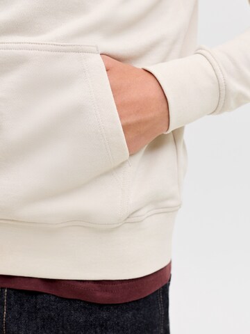 Jack & Jones Junior - Sudadera 'JJEARCHIVE' en beige
