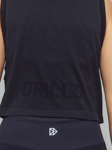DRILLS Apparel - Top deportivo 'FLXFLOW Layer Top' en negro