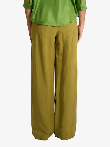 Wide leg Pantaloni con pieghe di Merci in verde