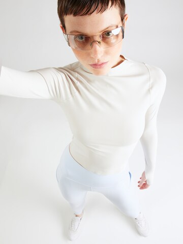 NIKE Skinny Sportovní kalhoty 'UNIVERSA' – modrá