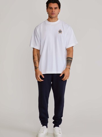 Coupe slim Pantalon de sport 'Essentials' SikSilk en bleu : devant