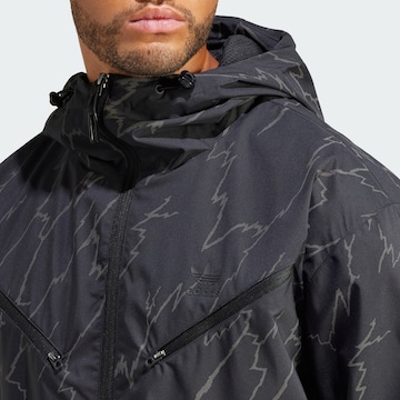 ADIDAS ORIGINALS Prehodna jakna 'Montreal' | črna barva