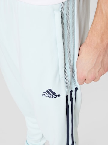 ADIDAS SPORTSWEAR Zwężany krój Spodnie sportowe 'Tiro' w kolorze niebieski