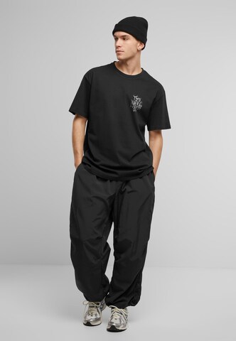 MT Upscale Футболка 'Not Like Us' в Черный