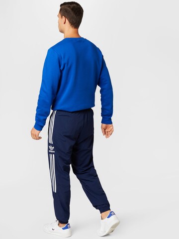 ADIDAS ORIGINALS Tapered Pants 'Adicolor Classics Lock-Up Trefoil' in Blue