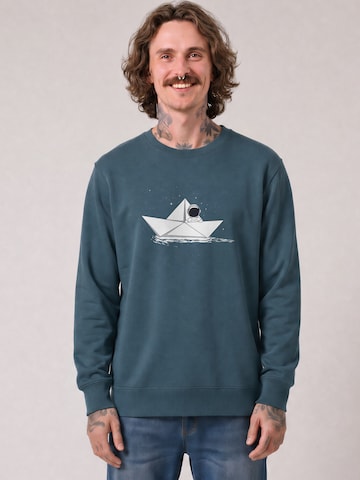 Watapparel Sweatshirt ' Astronaut in paper boat ' in Blauw: voorkant