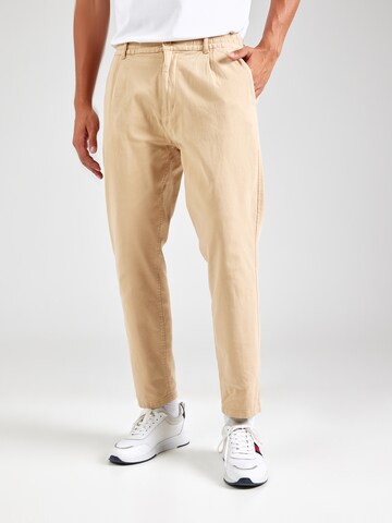 Effilé Pantalon à pince Tommy Jeans en beige : devant