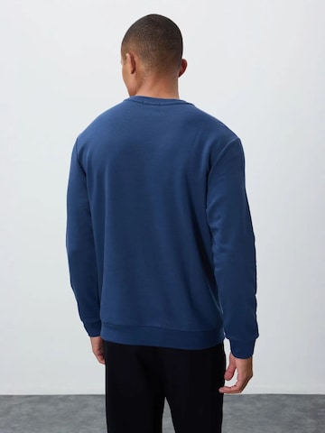Sweat-shirt Tommy Life en bleu