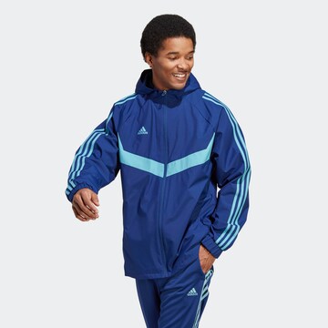 ADIDAS SPORTSWEAR Sportjacke 'Tiro Warm' in Blau: predná strana