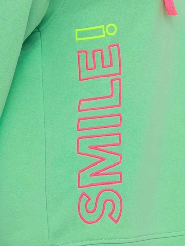Bluză de molton 'Smile' de la Zwillingsherz pe verde