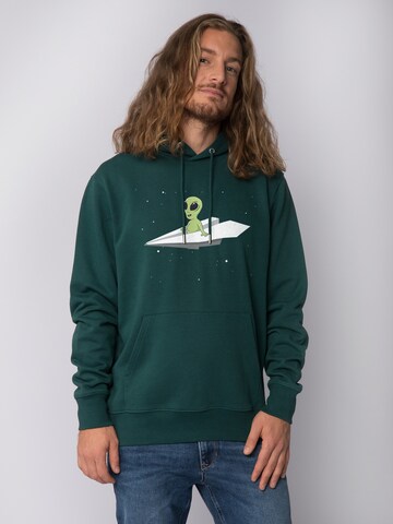 Sweat-shirt ' Alien on a paper plane ' Watapparel en vert : devant