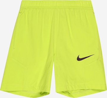 NIKE Regular Workout Pants in Yellow: front