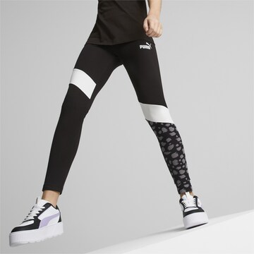 PUMA Skinny Leggings in Black: front