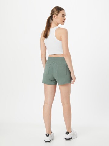 SKECHERS Regular Workout Pants in Green