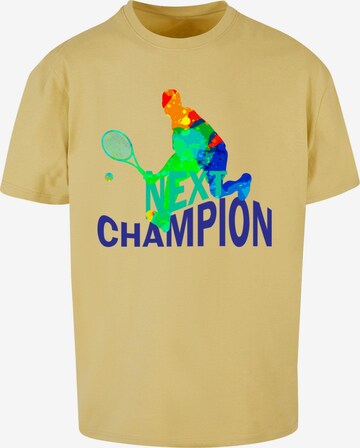 Merchcode Shirt 'Next Champion' in Geel: voorkant