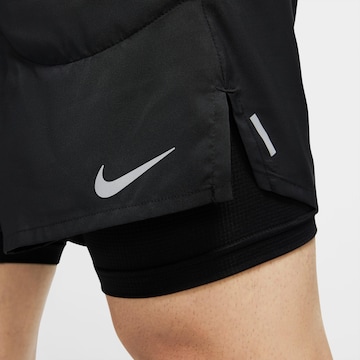 NIKEregular Sportske hlače 'Flex Stride' - crna boja