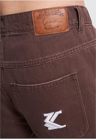 Regular Pantalon Karl Kani en marron