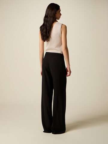 oltre Baggy Trousers in Black