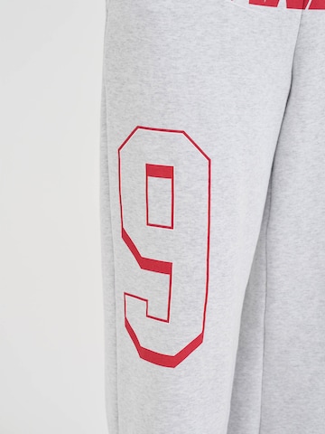 AND1 Široke hlačnice Hlače | siva barva