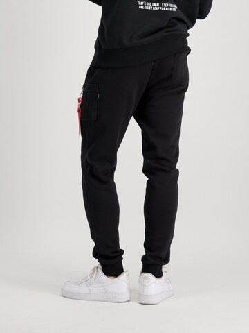 ALPHA INDUSTRIES Tapered Trousers in Black